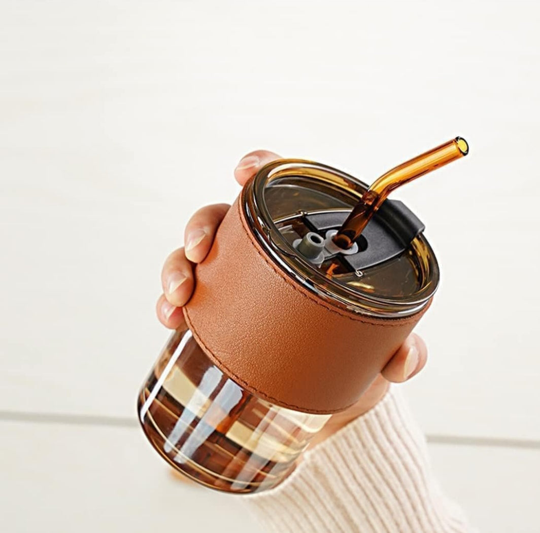 Glass with straw and cover