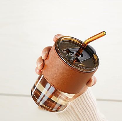 Glass with straw and cover